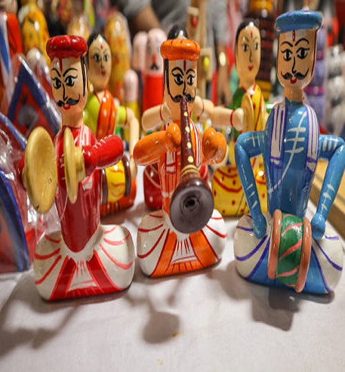 A Dramatic view of Channapatna toys made for Children using soft wood and painted with vibrant colors in Karnataka,India.