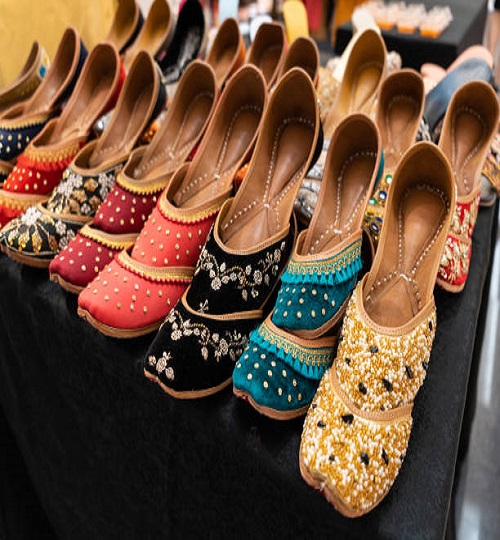 Various types of Indian jutti footwear selling in the shopping mall.